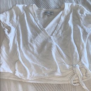 Madewell wrap top with tie closure and snap button